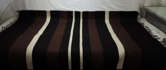 61x37" handmade indian rug.
