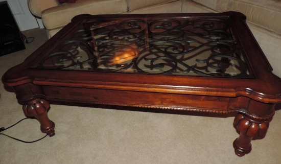 50x36x19" ornate glass top coffee table in excellent condition.