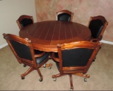 Beautiful flip top poker table with 5 adjustable height rolling chairs.