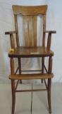 Antique oak high chair.
