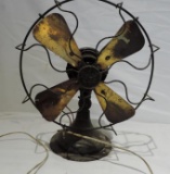 Vintage polar cub fan with brass blades in working condition.