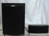 Polk Audio Model RM6750 powered sub woofer and center channel speaker.
