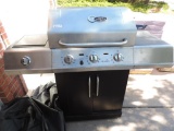 Charbroil red stainless steel gas BBQ.