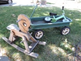 Vintage green wagon, rocking horse and mini boot scoot bike.