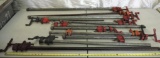 11 pipe clamps ranging from 52