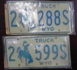 Two pair 1975 Wyoming Truck License Plates.