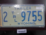 One 1975 Wyoming Trailer License Plate.