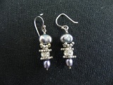 Silver and fresh water pearl dangle earrings.