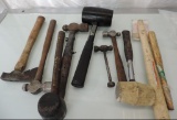 Assoted rubber mallets and hammers.