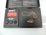 2 marked 14K gold bracelets, 1 gram total weight.