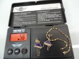 Marked 14 k bracelet and earrings, 5.8gr total weight with stones.