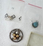 Taylord marked sterling pin, 925 earrings and silver colored pendant.