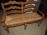 Nice weaved wicker seat bench .