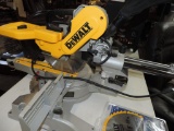 Dewalt Model DW717 Double bevel sliding compound miter saw with extra blade.