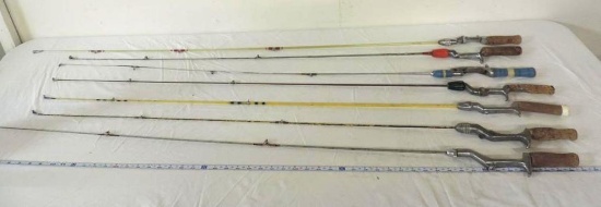 Seven 5-6' 1 piece vintage rods.