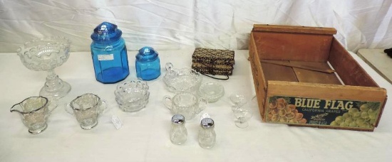 Silver overlaid creamer/ sugar, blue canister set, Blue flag grapes wood box and more.