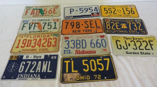 11 vintage license plates lot.