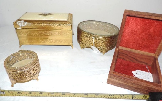 3 ornate brass dresser/ jewelery boxes and 5" carved wood box.