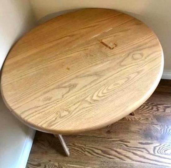 68x42" solid oak table with leaf and 6 Nichols and stone chairs.