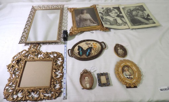 Six antique metal picture frames, wood framed picture, framed butterfly and 2 Shirley Temple prints.
