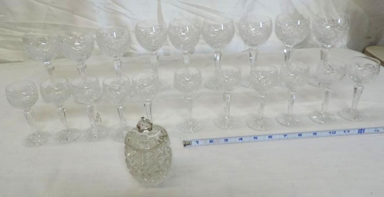 Nine 6.5" cut glass wine glasses, 11-4.5" cut glass snifters and a cut glass jam jar.