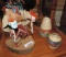 Kachina doll with two southwestern vases.