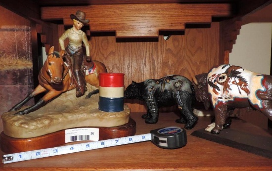 1981 Ski country barrel racer bourbon bottle and two unmarked figurines.