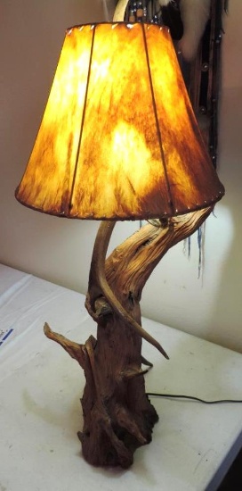 Driftwood and antler lamp with leather shade.