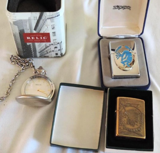 Two Zippo lighters and a relic pocket watch.