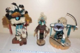 Three Kachina dolls.