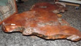 Impressive burl wood coffee table.