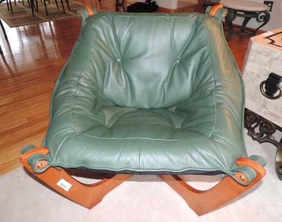 Luna teak wood green leather chair.