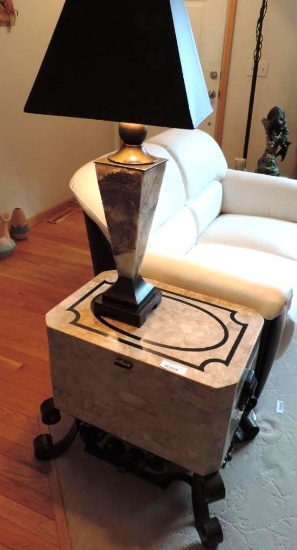Simulated stone lift top end table with stone lamp.