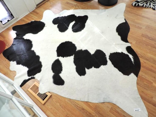 Cow hide rug.