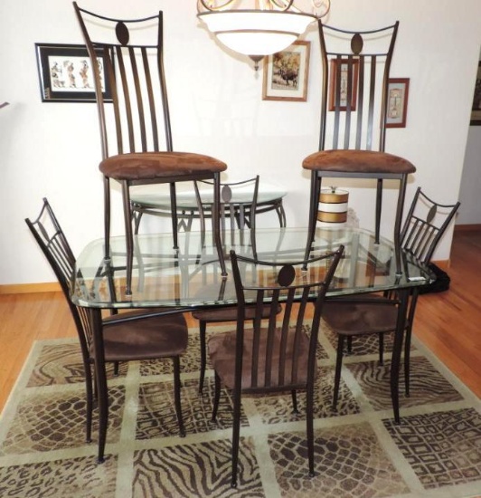 60x36x 29.5" glass top table with metal base and 6 chairs.