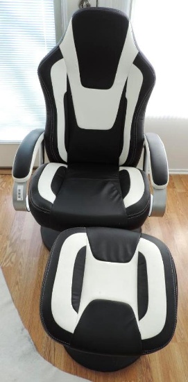 Modern black & white faux leather chair with foot stool.