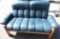 Ekornes stressless blue leather loveseat.