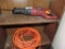 Chicago Electric recip saw and orange extension cord.