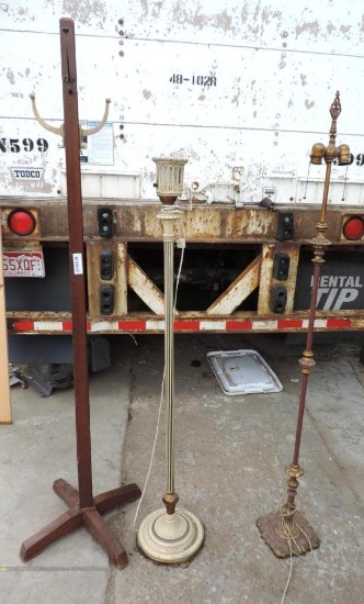 Two antique lamps and coat rack.