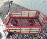 Neat metal wagon with adjustable sides.