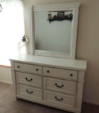 White 6 drawer dresser with mirror.