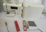 Bernina 1530 sewing machine with accessories.