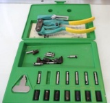 Whitney hole punch with case and accessories.