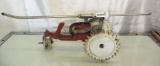 Thompson cast iron tractor sprinkler.