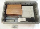 Box of assorted oil stones.