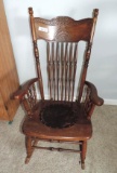Ornate antique rocking chair.
