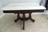 Marble top Eastlake style table.