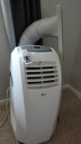 LG 10,000 BTU portable air conditioner with remote.