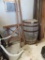 Full size whiskey barrel and primitive saw horse set.