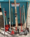 Large assortment of yard tools.